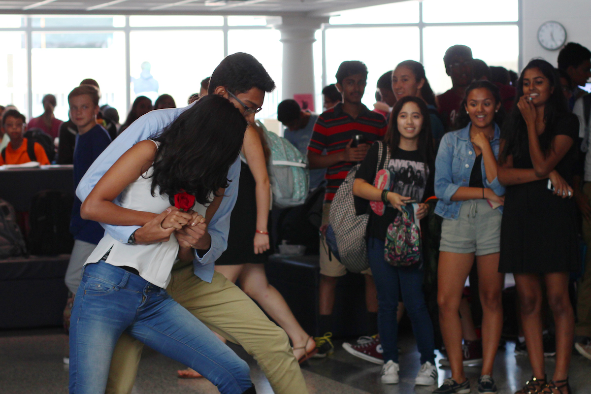 Junior Ishaan Dey and sophomore Pari Parajuli dance together at their homecoming asking.