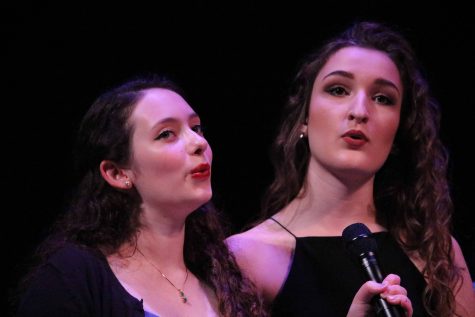 Ellie O' Reilly, left, and Abby Lyn Peterson, now graduated, sing as part of Show Choir in iNite 2016.