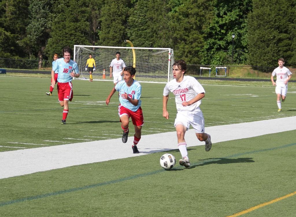 Boys+soccer+wins+first+district+tournament+game