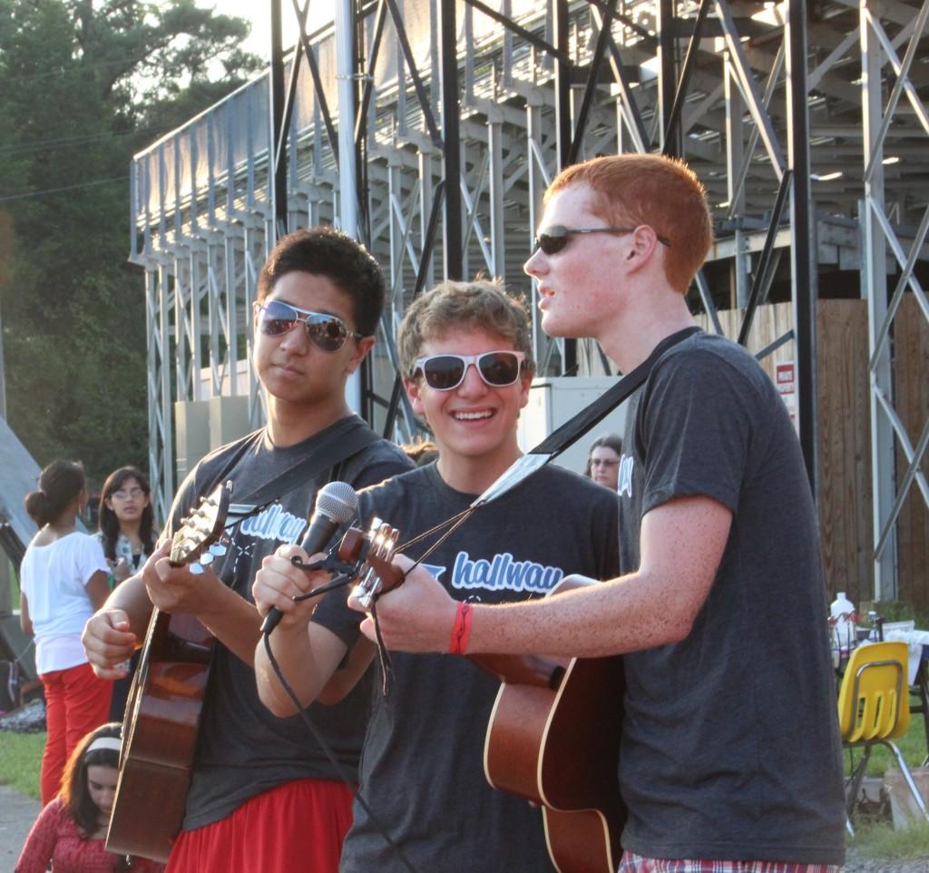 Seniors Michael Chan, Mookie Goodson and Ian McConnell, also known as the "Spice Boys," perform at the Back to School Bash.