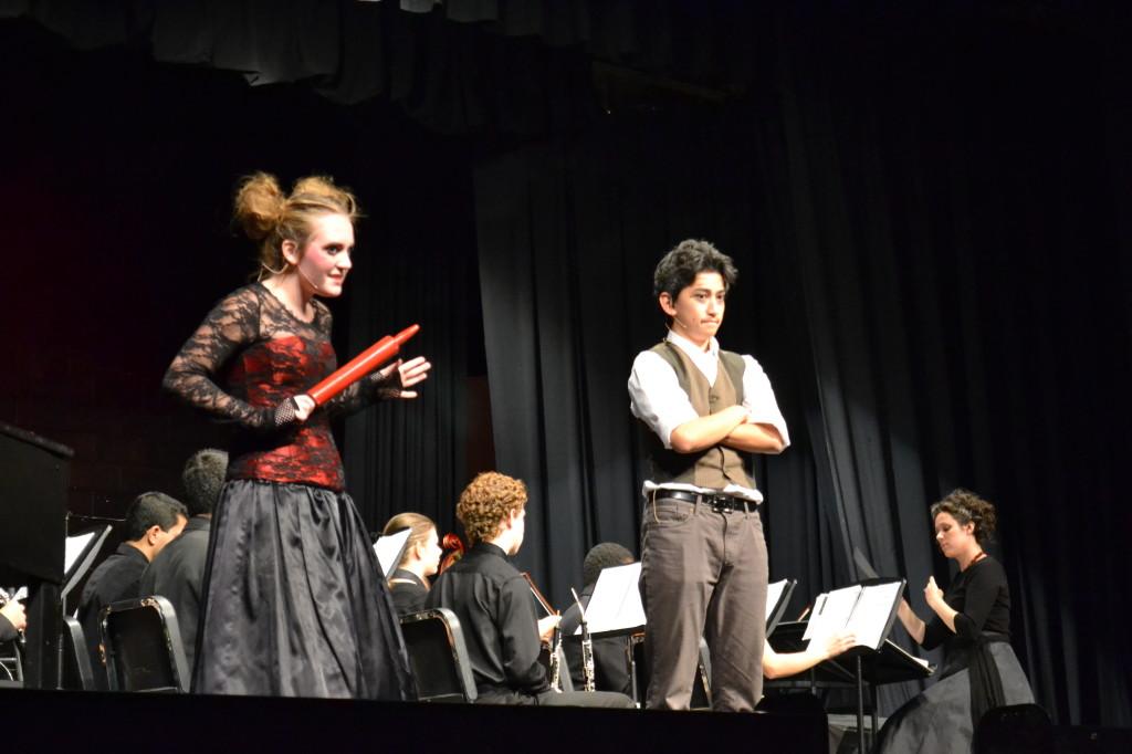 Mrs. Lovett (Senior Julia Ruth) and Sweeney Todd (Sophomore Adam Goldstein) make the decision to cook Todds victims into meat pies in A Little Priest.