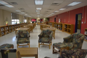 Furniture and bookshelves stand ready for the library re-opening in the math hallway in January.