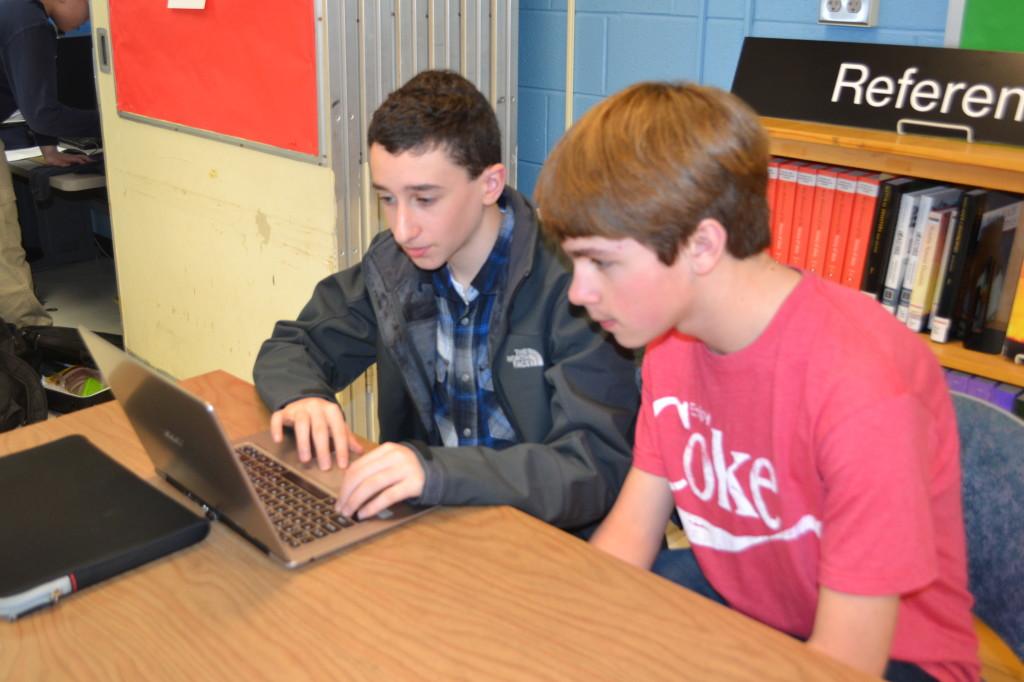 Freshmen+Daniel+Rubin+and+Patrick+Ryan+spent+multiple+lunches+researching+in+the+library+in+preparation+for+the+High+School+Academic+Business+Competition.+