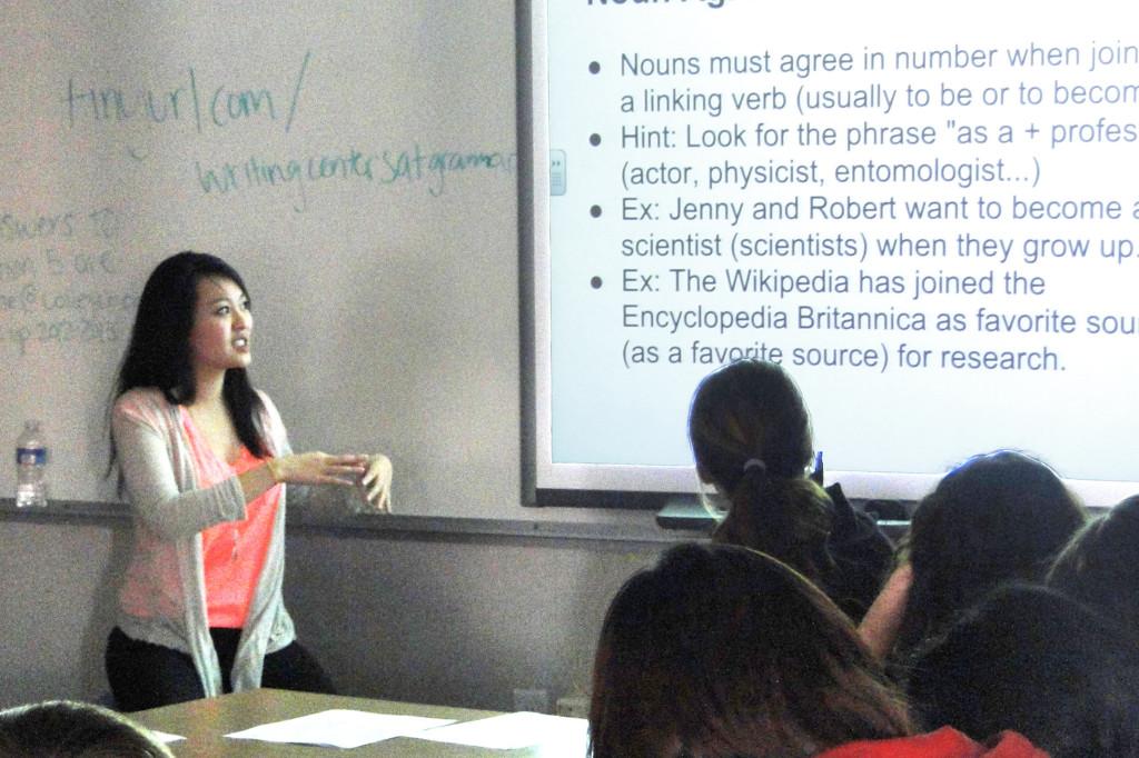 Senior+Michelle+Wang+explains+noun+agreement+concepts+to+underclassmen+preparing+for+the+SAT.+