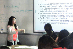Senior Michelle Wang explains noun agreement concepts to underclassmen preparing for the SAT. 