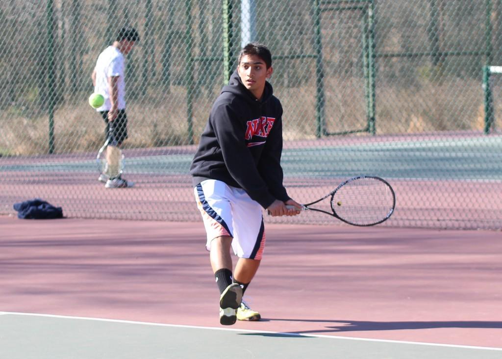 Freshman+Abishek+Bhargava+prepares+for+a+backhand+during+a+practice+match+on+April+2+at+Wakefield+Park.