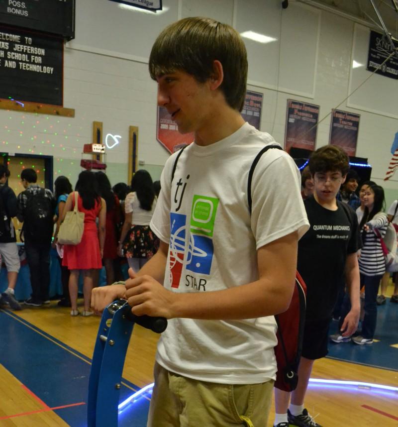 Junior Adam Reiss tries out an ElektorWheelie, a Segway-like self-balancing vehicle.