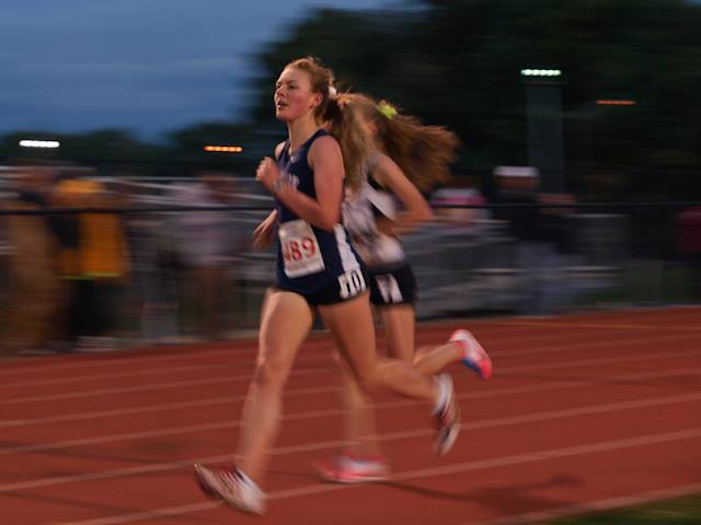 Junior Grace Zeng runs the 3200 meter run at Regionals. Photo courtesy of Jane Burhoe Anderson.