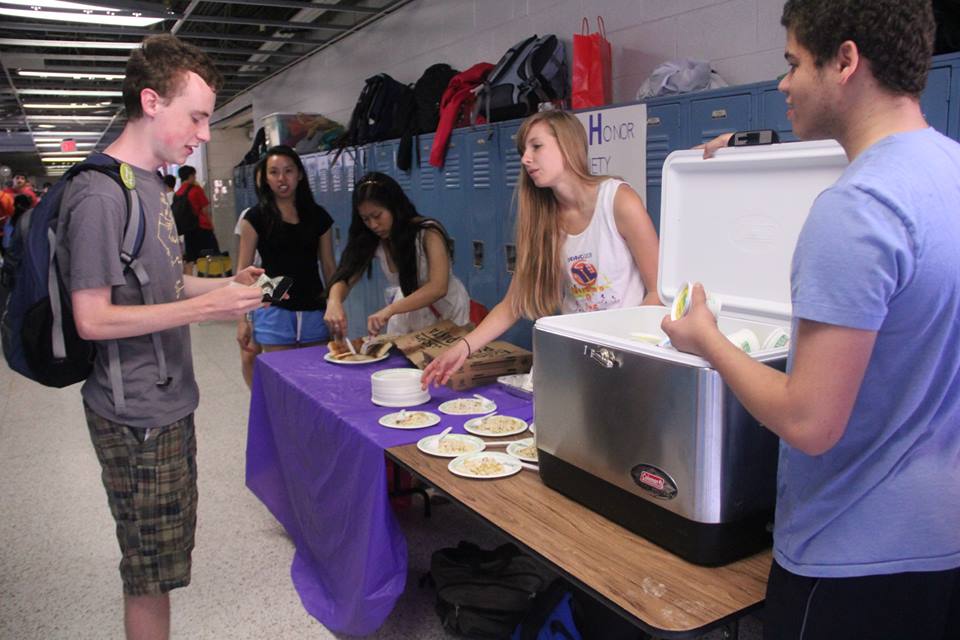 Club booths at J-Day offer food and activities to enjoy