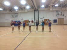 (left to right) Junior Lindsay Williams, sophomore Vivian Fang, sophomore Jennifer Song, sophomore Sarah Warrington, freshman Audrey Park, sophomore Bhavana Channavajjala, and freshman Melody Chiang hook up for a kickline as a part of the team’s new pom routine.