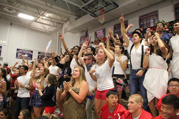 The class of 2014 cheers during their last Friday pep rally.