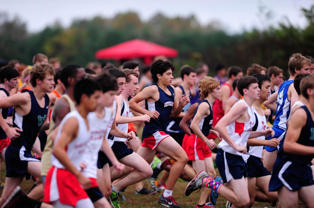 Photo courtesy of Steve Kan.
Junior Connor Simpson, freshman Giancarlo Valdetaro and sophomore Nate Foss get off to a strong start at the beginning of the JV Boys race.