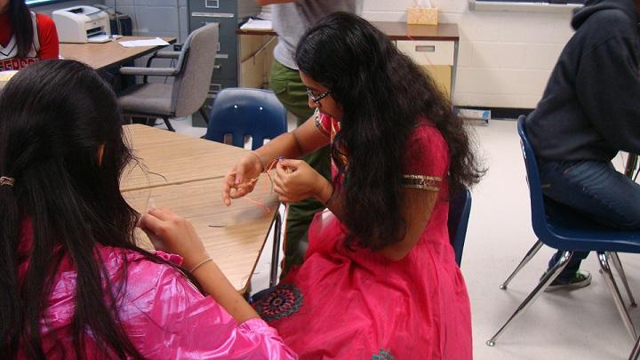 Sophomore Abha Agrawal creates a craft for the Little Sunshine Project.