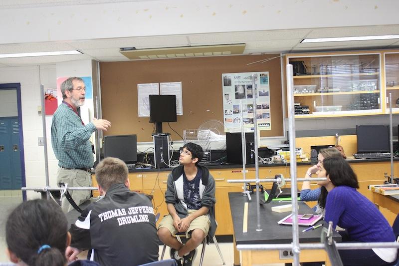 Physics teacher Stephen Scholla gives a lecture to his physics class.