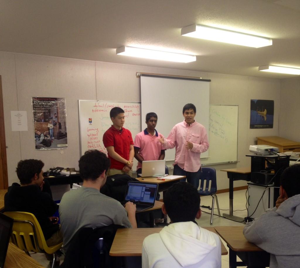 Officers at SciTalk encourage students to participate in a debate on pressing science-related issues. 