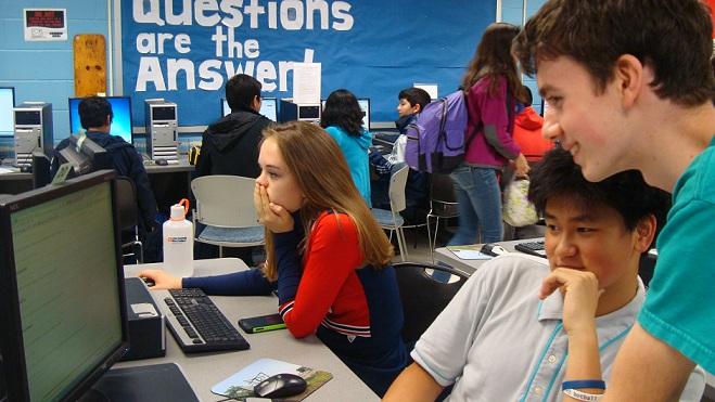 Sophomores Andy Zhao and Ryan Gottwald look through the online application portion that needs to be completed to participate in Science Olympiad.