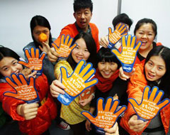 People around the world spread awareness by wearing orange. Photo courtesy of www.un.org.