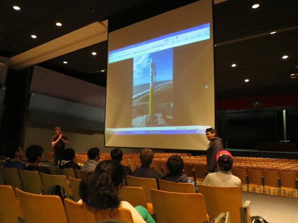 On Nov. 8, Energy Systems Lab Director Adam Kemp and senior Rohan Punnoose give a presentation about the satellite in the auditorium on Nov. 8.