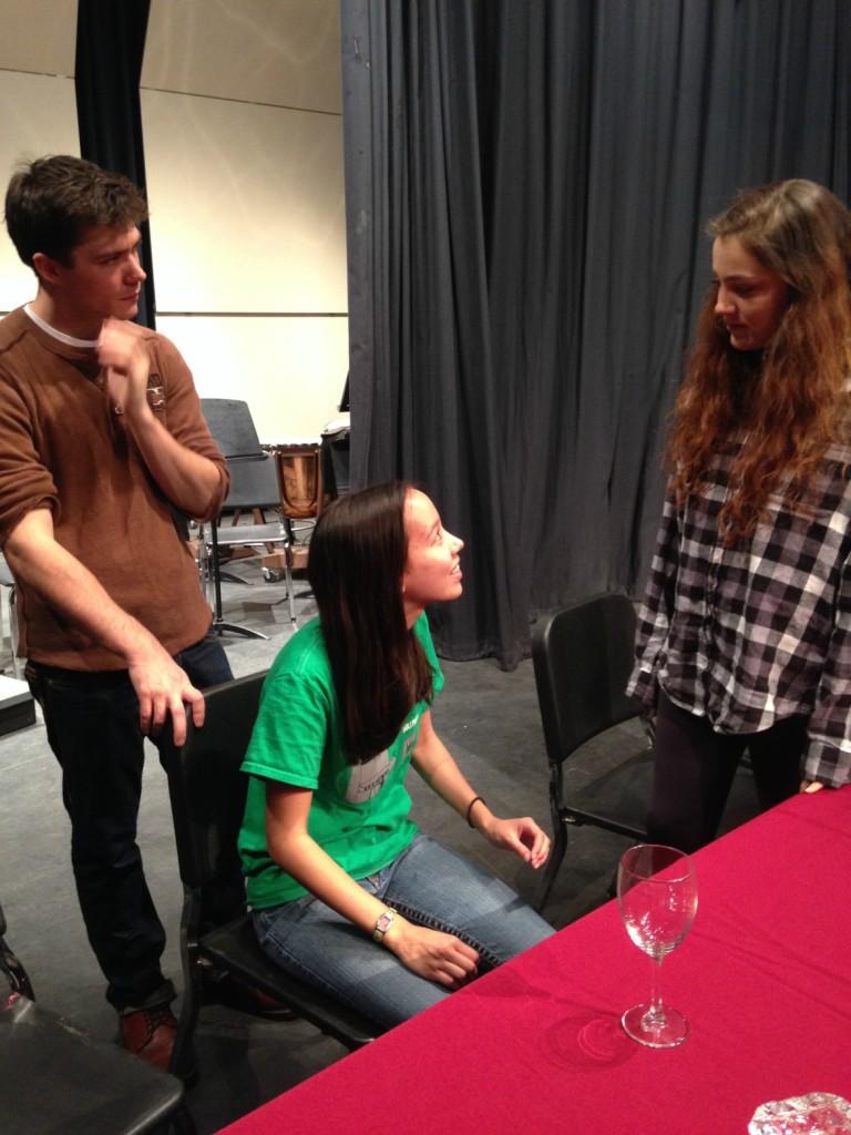 Director Zachary Roberts works with seniors Liesl Jaeger and Jordan Goodson.