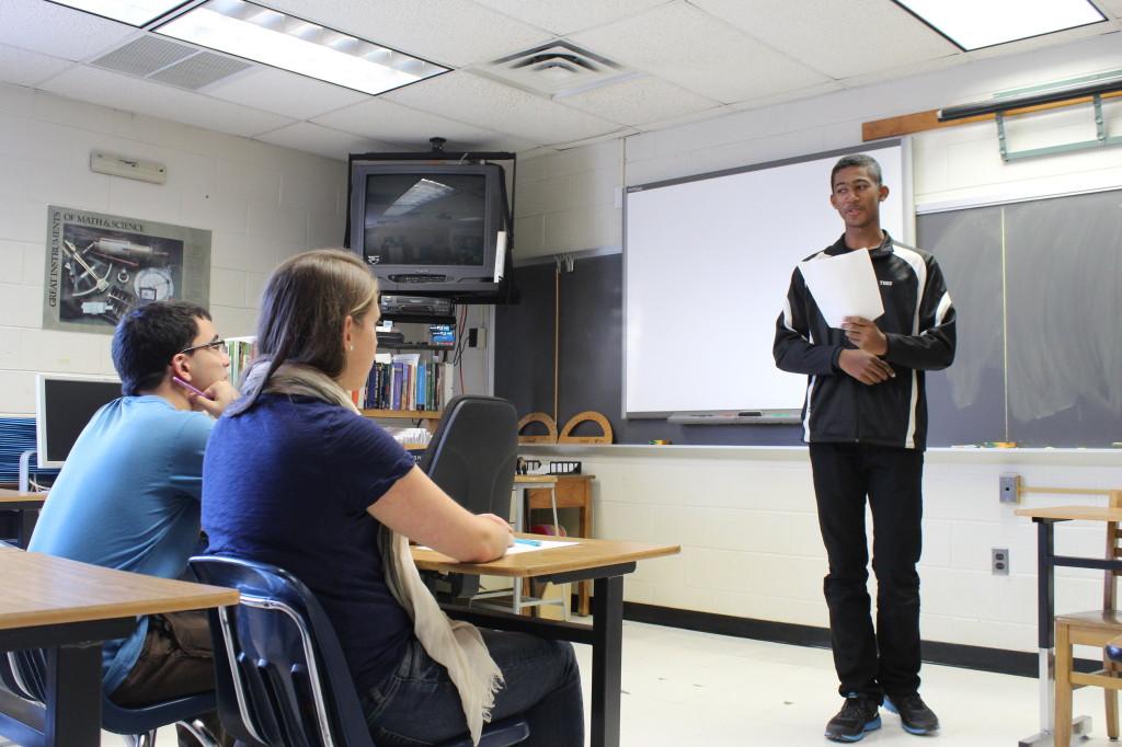 Directors Daniel Sainati (left) and Mikaela Ruiz-Ramon (middle) watch Theo Richardson (right) during his audition. 