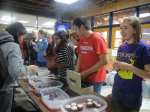 Meyers works to raise money for the American Sign Language Club at a bake sale held before eighth period.