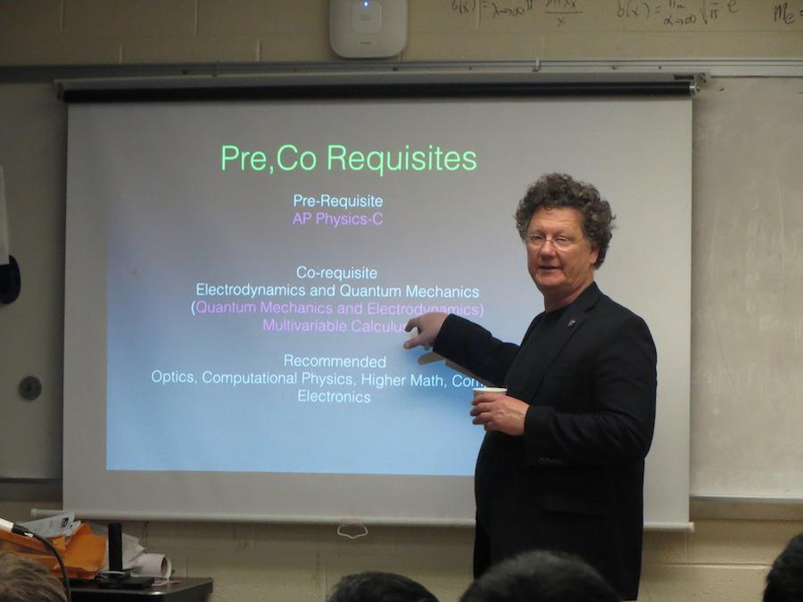 Optics and Modern Physics Lab Director John Dell gives a presentation for juniors on Dec. 4. Photo by Ellen Kan.