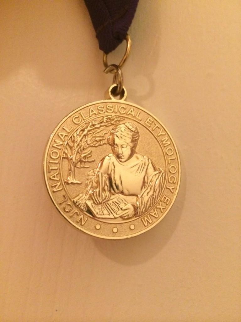 The NCEE gold medal, designed by Class of 2013 Jefferson graduate Hillary Liu.