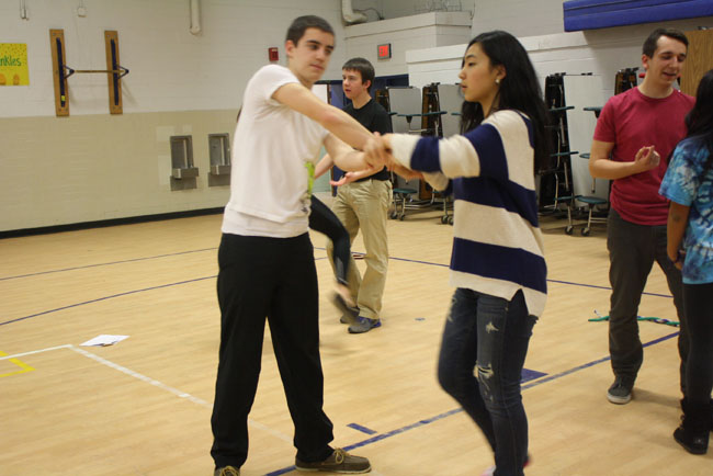 Seniors Anna Seo and Brad Rosenblum practice for Swing Dance's I-Nite performance.