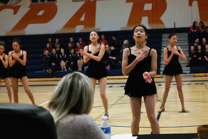 Freshman Emma Zhang performs with the team as a part of the competition.
