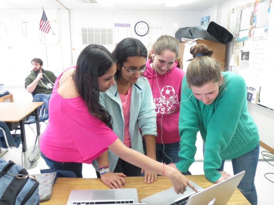 Members of the Future Energy Action Team (FEAT) discuss plans for the club, which meets every Monday eighth period during B-block.