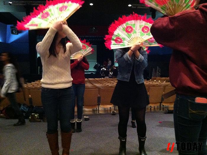 Korean Culture Club practices with fans for I-Nite.