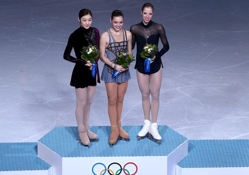 Kim Yu-na, Adelina Sotnikova and Carolina Kostner stand on the podium after the women's figure skating event.

Photo courtesy of Olympics.org.