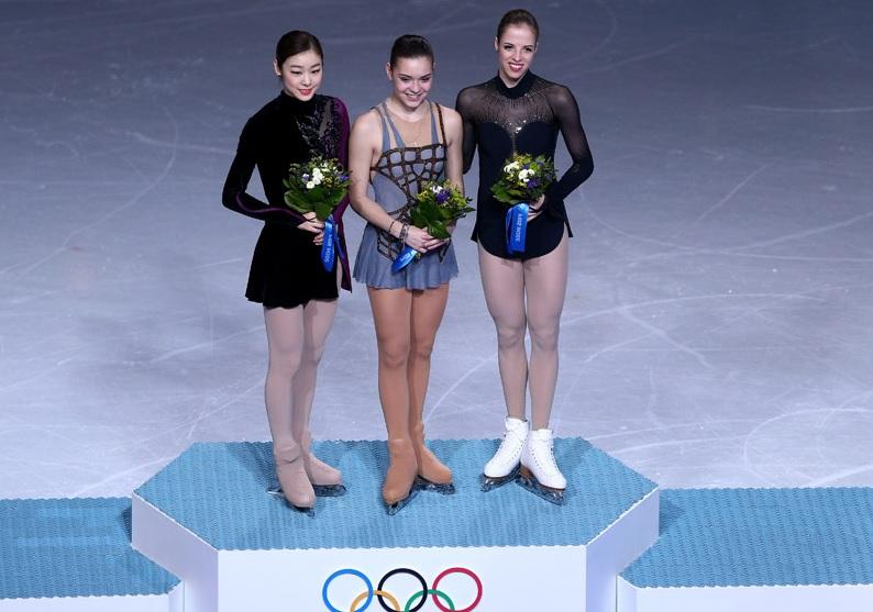 Kim Yu-na, Adelina Sotnikova and Carolina Kostner stand on the podium after the womens figure skating event.

Photo courtesy of Olympics.org.