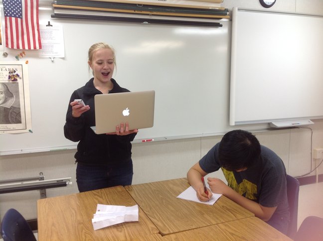 Seniors Yana Kaplun and Richard Wang practice their debate speeches and note taking skills.