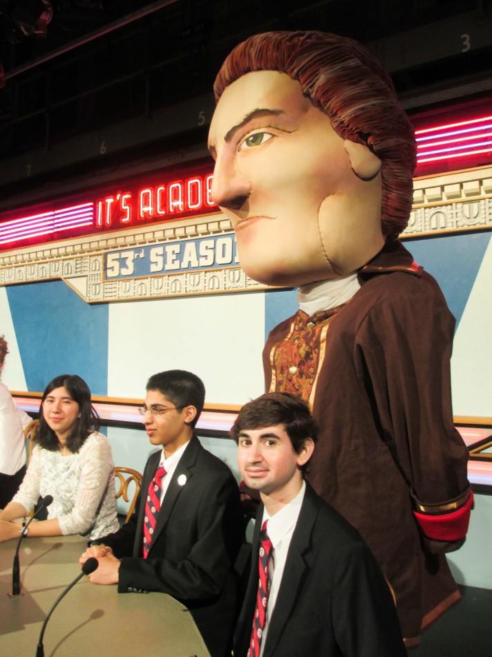 Left to right: seniors Nadège Aoki and Sidharth Verma and sophomore Ryan Golant compete at the "It's Academic" playoffs on March 8.