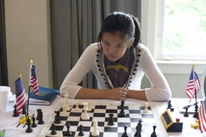 Sophomore Joie Wang playing chess. Photo courtesy of Dora Leticia.