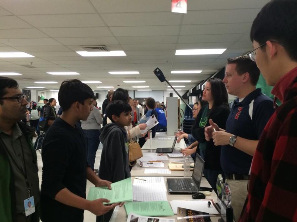 Incoming freshmen meet with representatives from Jefferson's band program during the open house held at Luther Jackson Middle School on the evening of April 8.