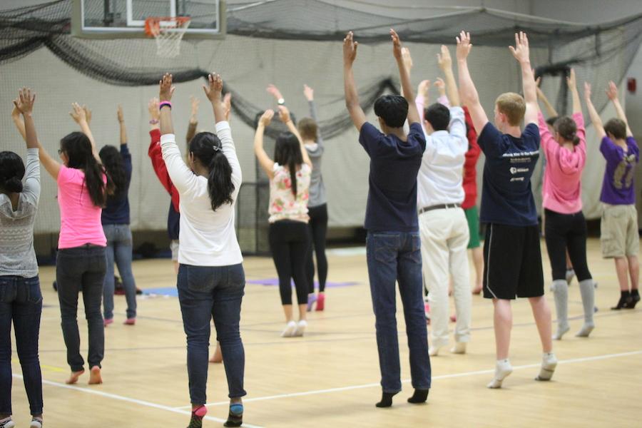 Students partake in yoga as part of Stress Less, Laugh More week.  Photo by Sandy Cho.