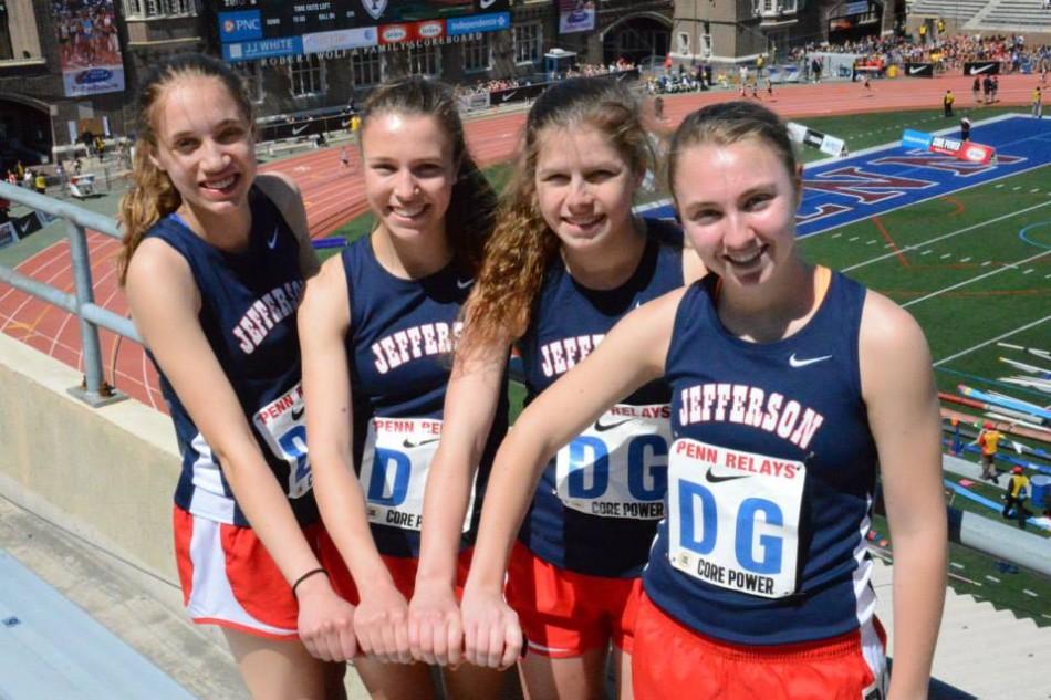 Left to right: juniors Charlene Franke, Emily Moschella, Katrina Junta and Haley Stumvoll ran a new best time for the girls' 4x400-meter relay.