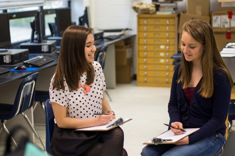 Sophomore Sophia Moses and freshman Kristin Myers simulate a restorative justice circle conversation.