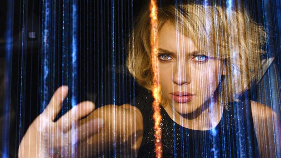 Lucy (Scarlett Johansson) uses her further brain capacity to find the gangsters through using phone signals she can now see. Photo courtesy of www.lucymovie.com.