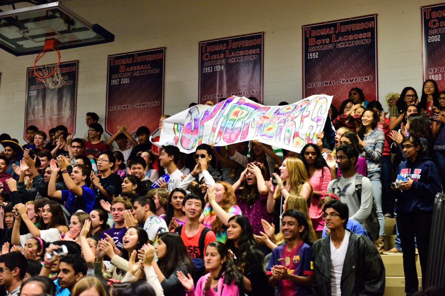 The sophomores show their spirit by raising a banner during roll call.