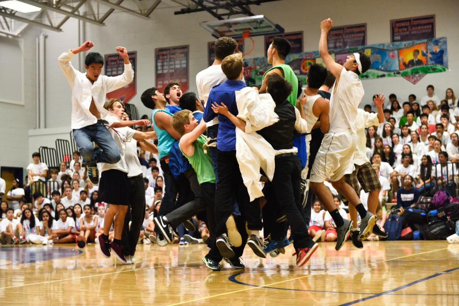 Senior MEX dancers explode out of formation at the end of "Gonna Fly Now," the theme song from the movie "Rocky."