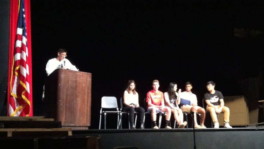 (left to right) Juniors James Park, Sophia Moses, Spencer Weiss, Christina Wei, Kunal Naik and Will Ryu gather on the stage of the auditorium to discuss plans for the upcoming school year with the Class of 2016.