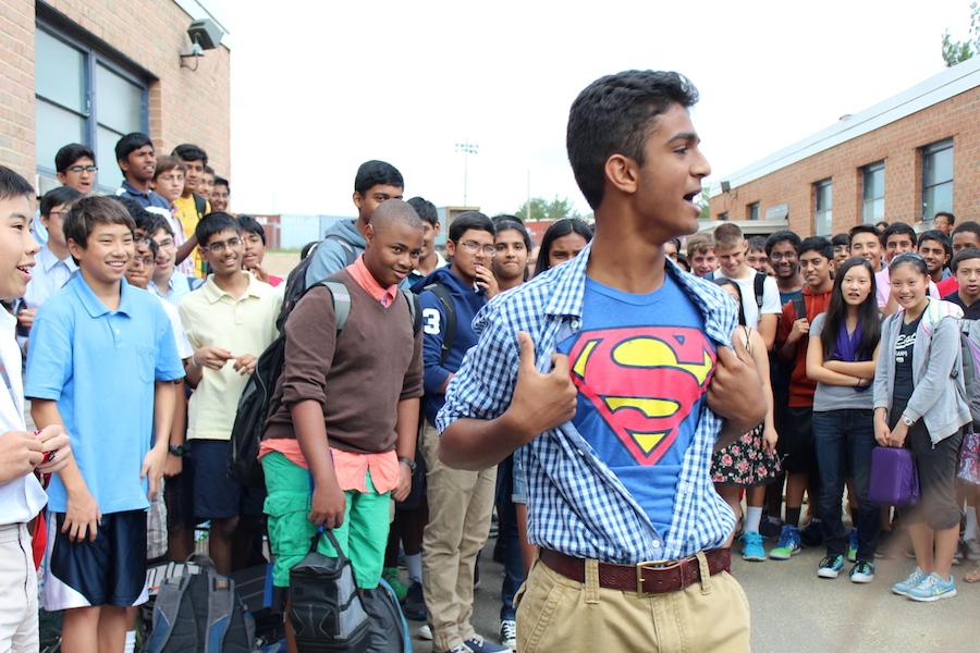 Sophomore Sishaar Rao displays his Superman shirt beneath a plaid button-down for his asking.