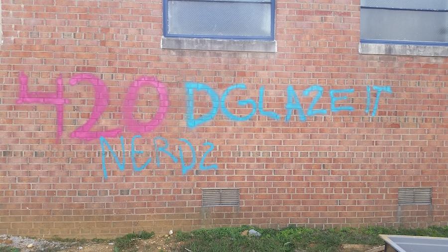 Graffiti graced the brick wall outside the main entrance on Oct. 20.