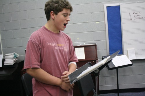 Sophomore Matthew Heninger prepares his voice before auditions