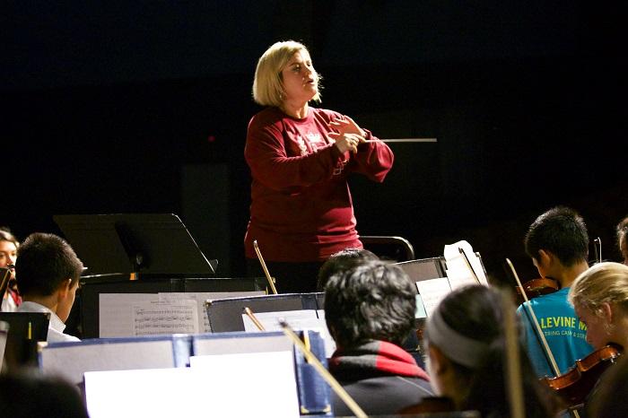 Orchestra director Allison Bailey leads the Symphonic and Harmonic orchestras in the fall concert.