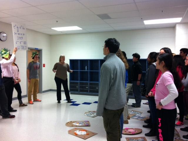 members of LHS run through the cheers for the upcoming convention with new attendees.