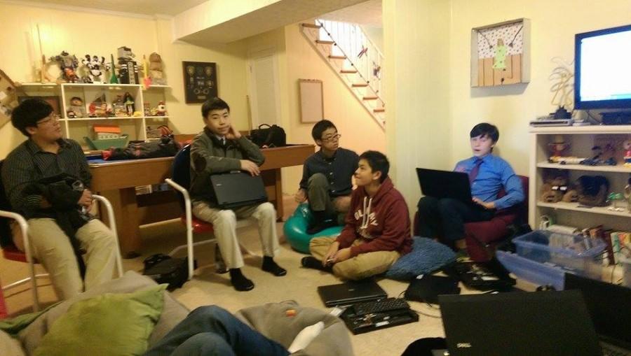 Members of Reboot for Youth gather for a meeting to discuss their latest project of refurbishing computers.